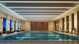 Πισίνα στο ή κοντά στο New Century Grand Hotel