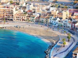 an aerial view of a beach with buildings at BluehousePortixol Mallorca in Palma de Mallorca +54 photos