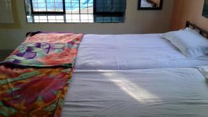 Letto o letti in una camera di Barve Homes