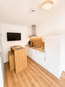 Virtuvė arba virtuvėlė apgyvendinimo įstaigoje Hotel Lercher