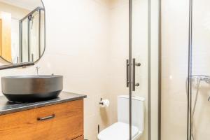 a bathroom with a sink and a shower at Calpe Bay Masnou 24 in Calpe +20 photos