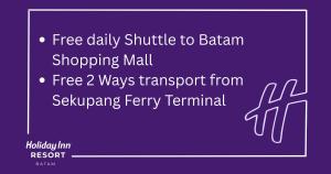 a purple sign that says free daily stimulus to brain shopping mall at Holiday Inn Resort Batam by IHG in Sekupang