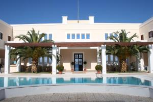 Bazén v ubytování Nissia Traditional Residences Spetses nebo v jeho okolí
