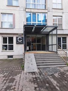 a building with steps leading into a building at Carmen Suite in Esenyurt