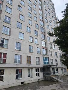 a large apartment building with many windows at Carmen Suite in Esenyurt