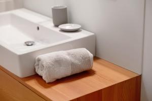 a bathroom with a sink and a towel on a counter at Chalet Oberjuval in Kastelbell-Tschars +37 photos