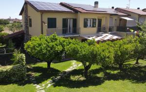 a house with solar panels on the roof at In ta Villa da u Perinetti in Bastia