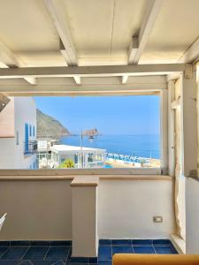 a balcony with a view of the ocean at Vivi Marettimo in Marettimo