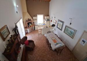 an overhead view of a living room with a table at Villa Posta Vecchia in Loreo