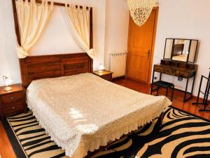 a bedroom with a bed and a dresser and a mirror at Villa SOLE di AMORE - POOL PRIVATE LARGE 100 M 2 - Beach 950m -Center 500 m - ROME & AIRPORT 39 km in Anzio +33 photos