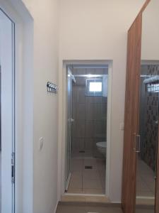 a bathroom with a shower and a toilet at Vila Nina Donji Štoj in Ulcinj +53 photos