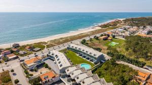 an aerial view of a resort near the beach at Pedrinhas Village by Geyra in Esposende