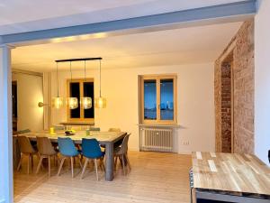 a dining room with a table and chairs at berg zeit in Hinterzarten in Hinterzarten