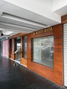 a building with a storefront with a built in maria at Palette - Bukit Mata Boutique Hotel in Kuching