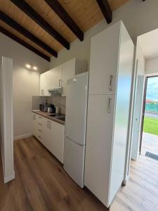 Køkken eller tekøkken på Apartamentos COTTAGE