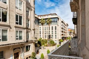 a view of a street in a city with buildings at YBH Mare Boutique in Vigo