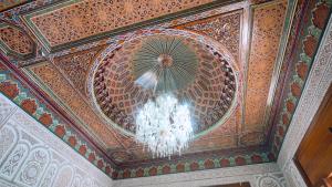 a chandelier hanging from the ceiling of a building at Villa Majlis in Marrakesh
