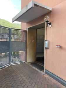 an entrance to a building with a door open at Fortezza in Bellinzona