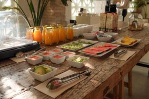 a table with a bunch of different types of food at Cortijo de la Seda in Granada +114 photos