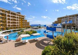 a view of the pool at a resort at Студио Релакс, Ахелой in Aheloy