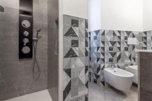 a bathroom with a shower and a sink and a toilet at NURAS - Affittacamere L'Azzurra - Double bedrooms private bathroom and seaview solarium in Sorso +48 photos