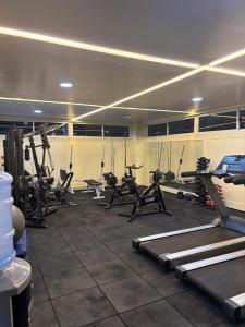 a gym with several treadmills and exercise bikes at Gran Lençóis in Barreirinhas