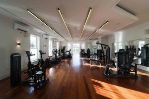 a gym with a bunch of treadmills and exercise bikes at Nuremore Estate in Carrickmacross