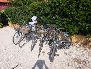 a group of bikes parked next to each other at Casa di Campagna in Fregene