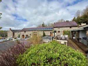 a house with solar panels on the roof at The Stables in Llandysul