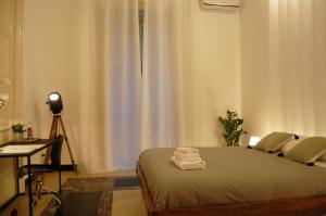 Postel nebo postele na pokoji v ubytování B&B 4 ELEMENTI CATANIA