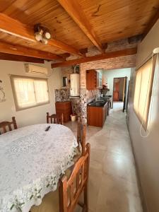 a kitchen with a large bed in a room at Mi hogar in Guaymallen