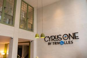 a sign on the side of a building at Cyrus One By Trivelles in Islamabad