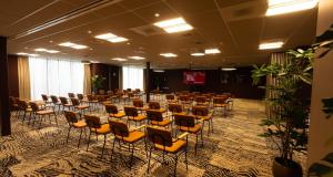 a conference room with tables and chairs in it at City Hotel Gouda, WorldHotels Crafted in Gouda