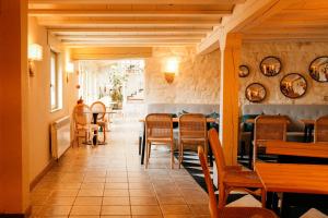 a restaurant with tables and chairs in a room at Maison Barón de la Galleta B&B in Quintanilla las Torres +96 photos