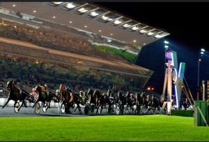 a group of horses and riders in a horse race at Top Studio SV1020 Centre Vincennes 20M2 in Vincennes