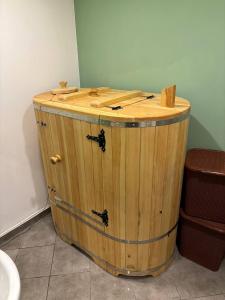 a wooden barrel in a room with a sink at Nafta Sanatorium in Naftalan +62 photos
