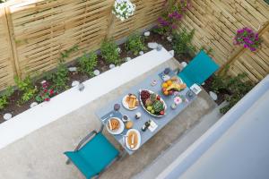 an overhead view of a table with food on it at Diana's Houses in Gythio +101 photos