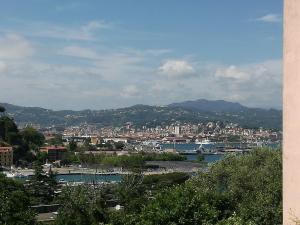 a view of a city with a river and a town at Venus and the Sea in Fezzano