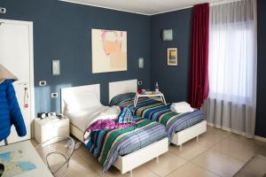 Säng eller sängar i ett rum på Affittacamere Polvara Trentuno