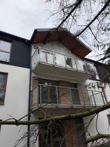 an image of a house with a balcony at Apartament 59 Bystra Park in Bystra