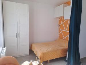 Llit o llits en una habitació de Simplement