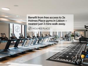 a gym with rows of treadmills and a sign at LSA Parque by Numa in Lisbon
