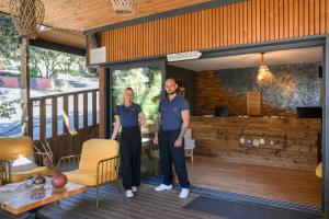 a man and a woman standing on the porch of a house at Villa Occitana in Calvisson +88 photos