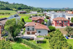 an aerial view of a suburb with houses at Villa dante in Alba