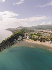 an aerial view of a beach and the ocean at NUA Apartments in Ulcinj