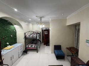 a room with two bunk beds in it at Hostal Atlantis Middle World in Quito +19 photos
