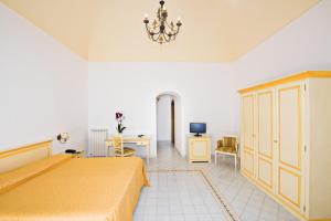 Voodi või voodid majutusasutuse Albergo California toas