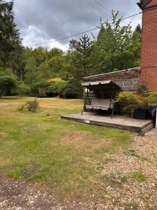 a porch of a house with a building at Herberts Cottage in Wormegay