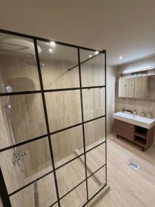 a bathroom with a shower and a sink at MOLA PAPAYA STUDIOS in Mola Kalyva +75 photos