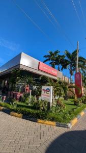 a store on the side of a street at Nancy's Haven studio apartment in Mombasa